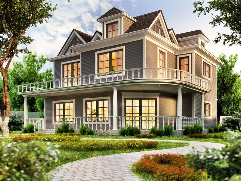 Stately grey house exterior showing pristine white columns and trim