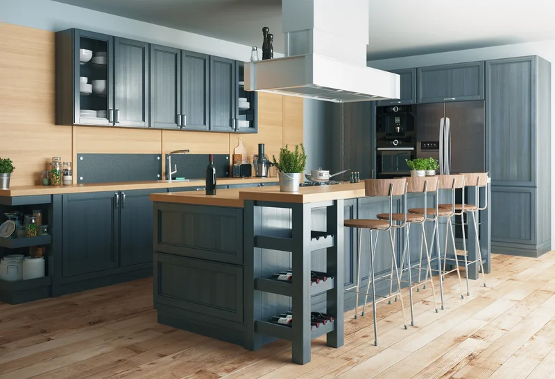 Blue painted kitchen cabinets and island with wooden countertops