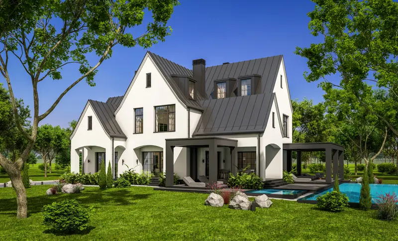 Luxury modern farmhouse exterior painted white with dark trim
